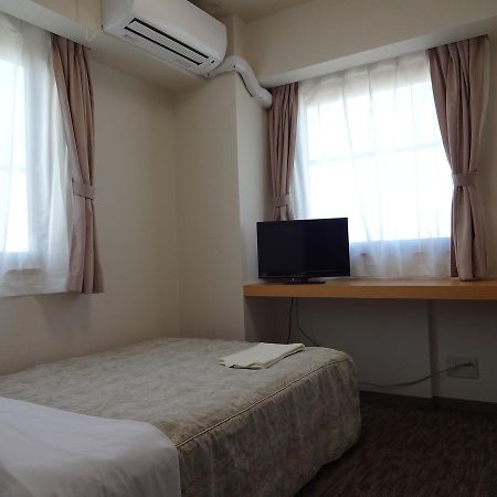Ushiku City Hotel Ekimaekan Extérieur photo