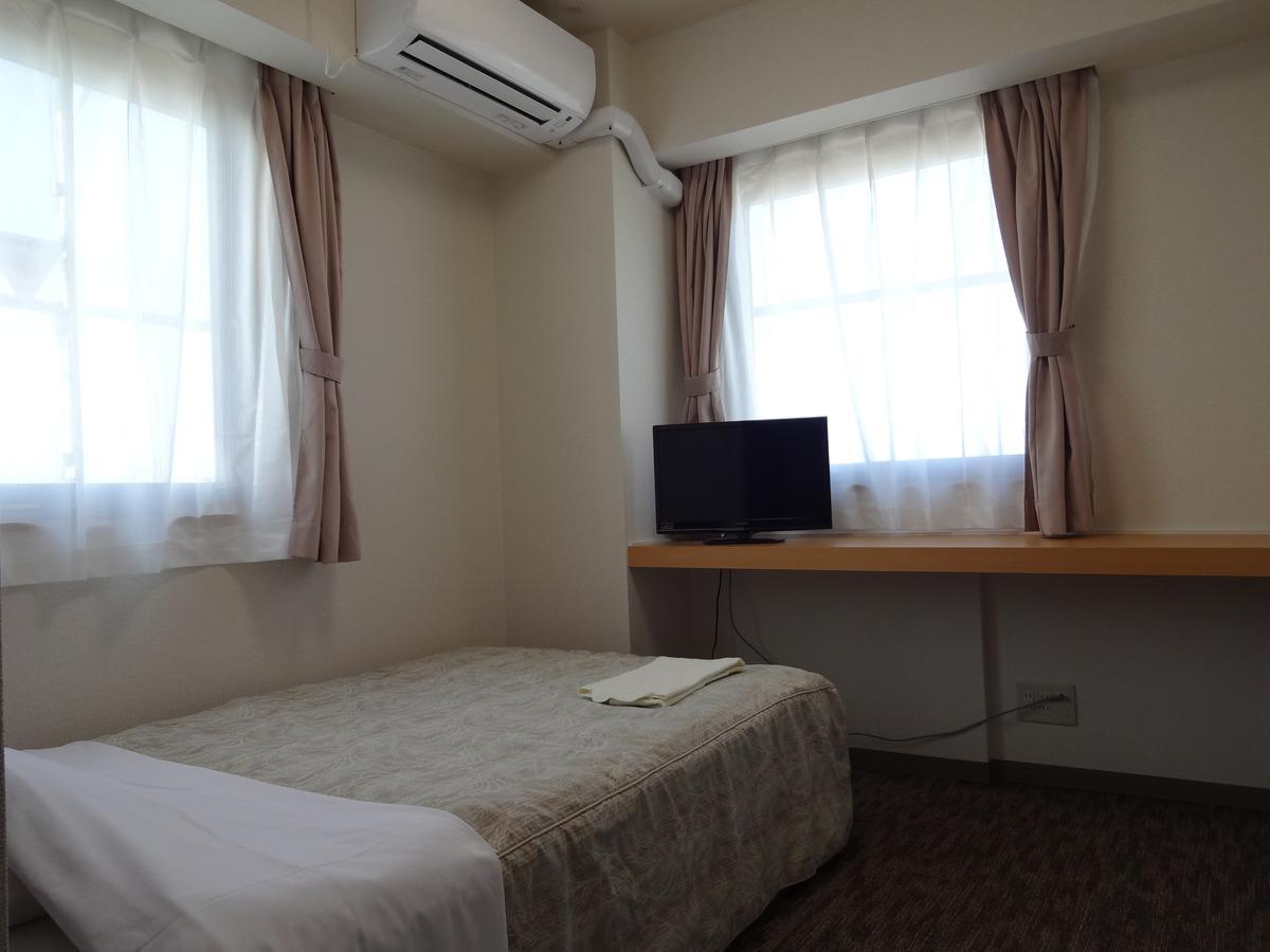 Ushiku City Hotel Ekimaekan Extérieur photo