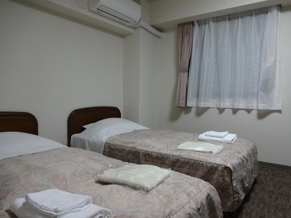 Ushiku City Hotel Ekimaekan Extérieur photo