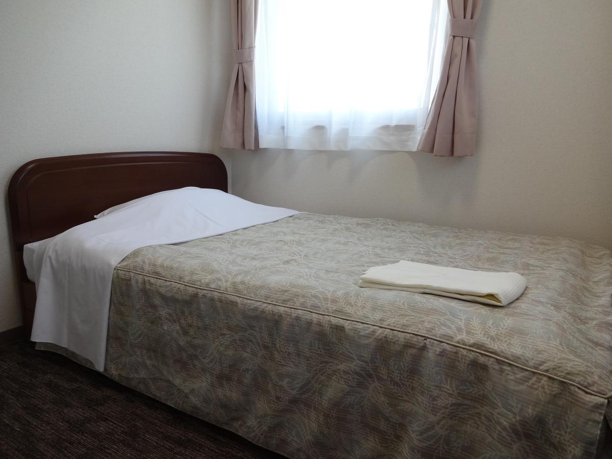 Ushiku City Hotel Ekimaekan Extérieur photo