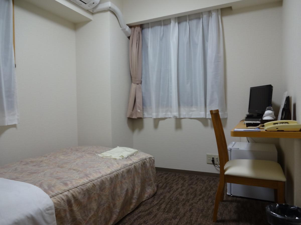 Ushiku City Hotel Ekimaekan Extérieur photo