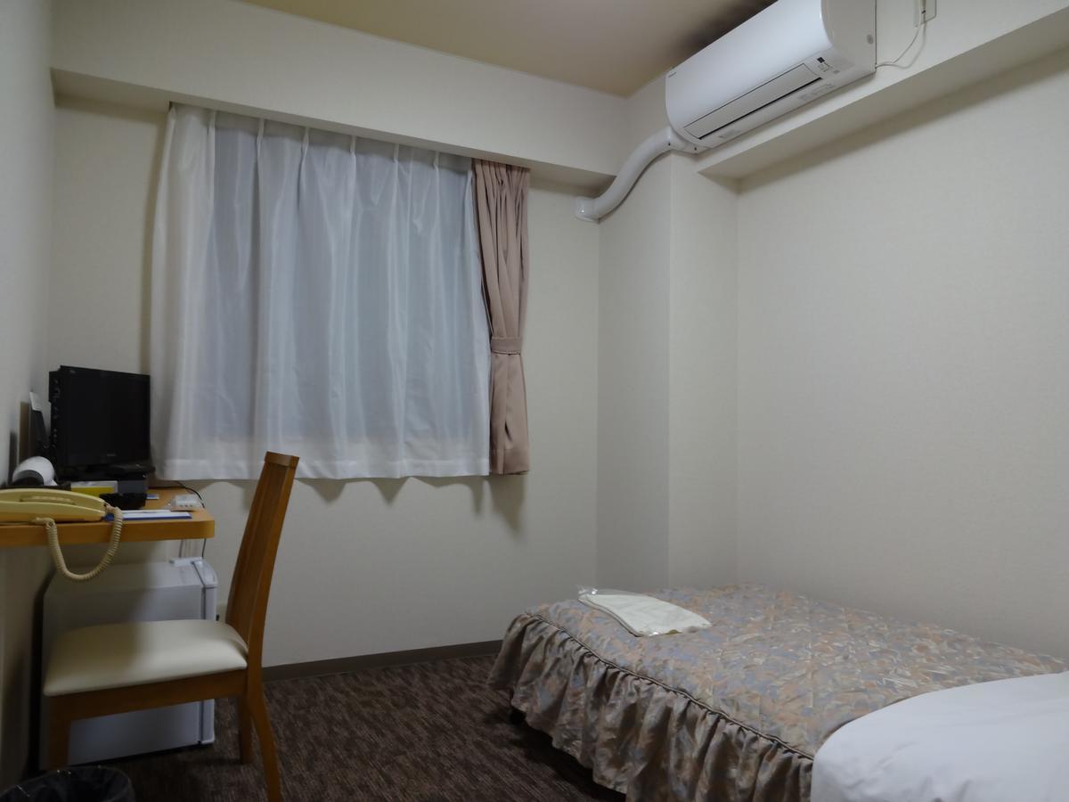Ushiku City Hotel Ekimaekan Extérieur photo